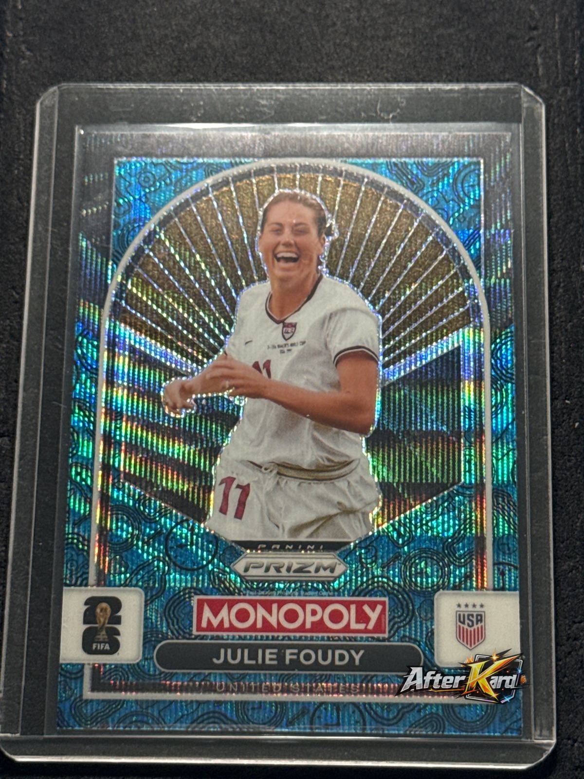 2026 Panini Monopoly Prizm FIFA World Cup 26 — Julie Foudy Blue Wave Prizm