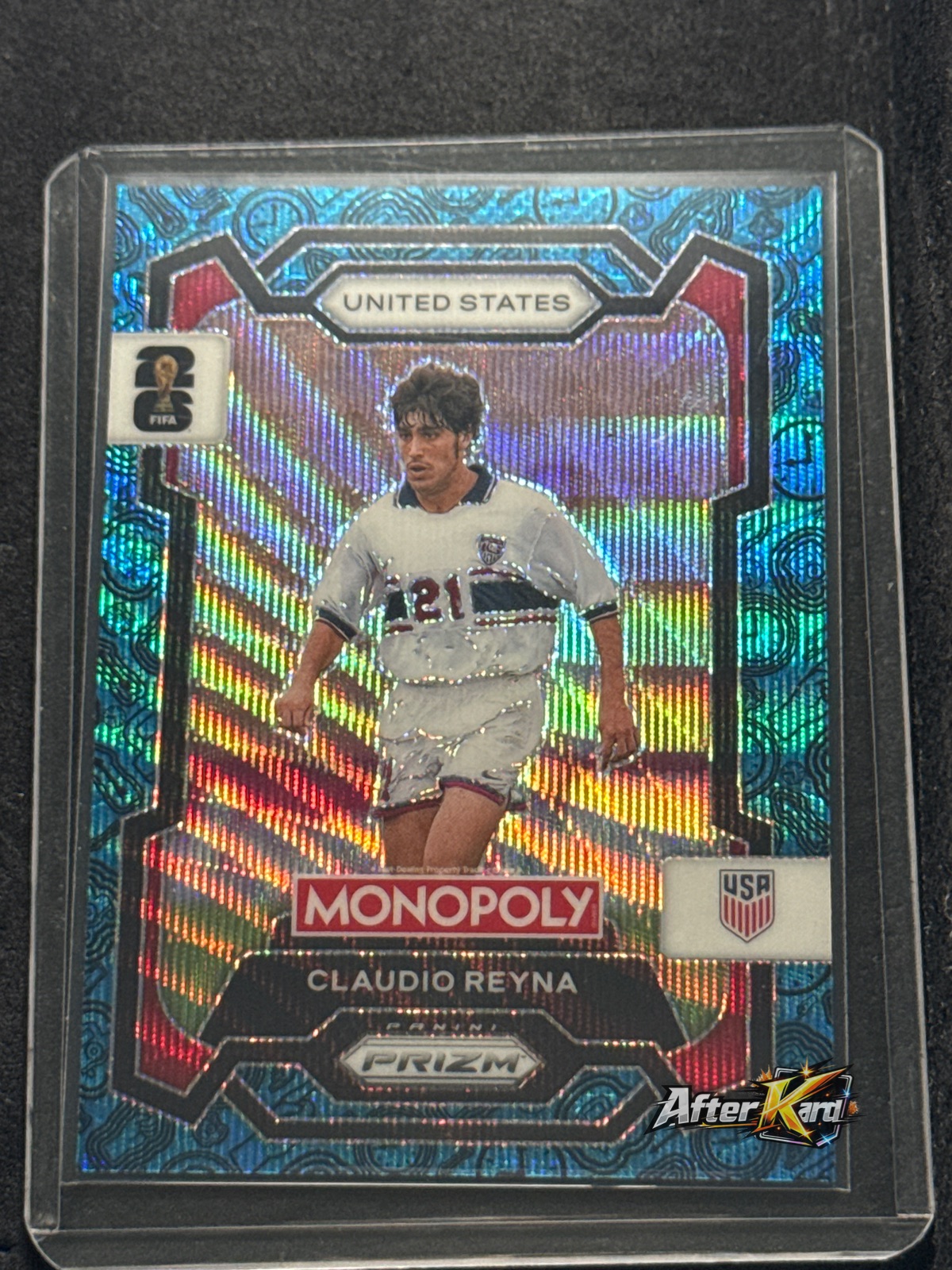 2026 Panini Monopoly Prizm FIFA World Cup 26 — Claudio Reyna Blue Wave Prizm