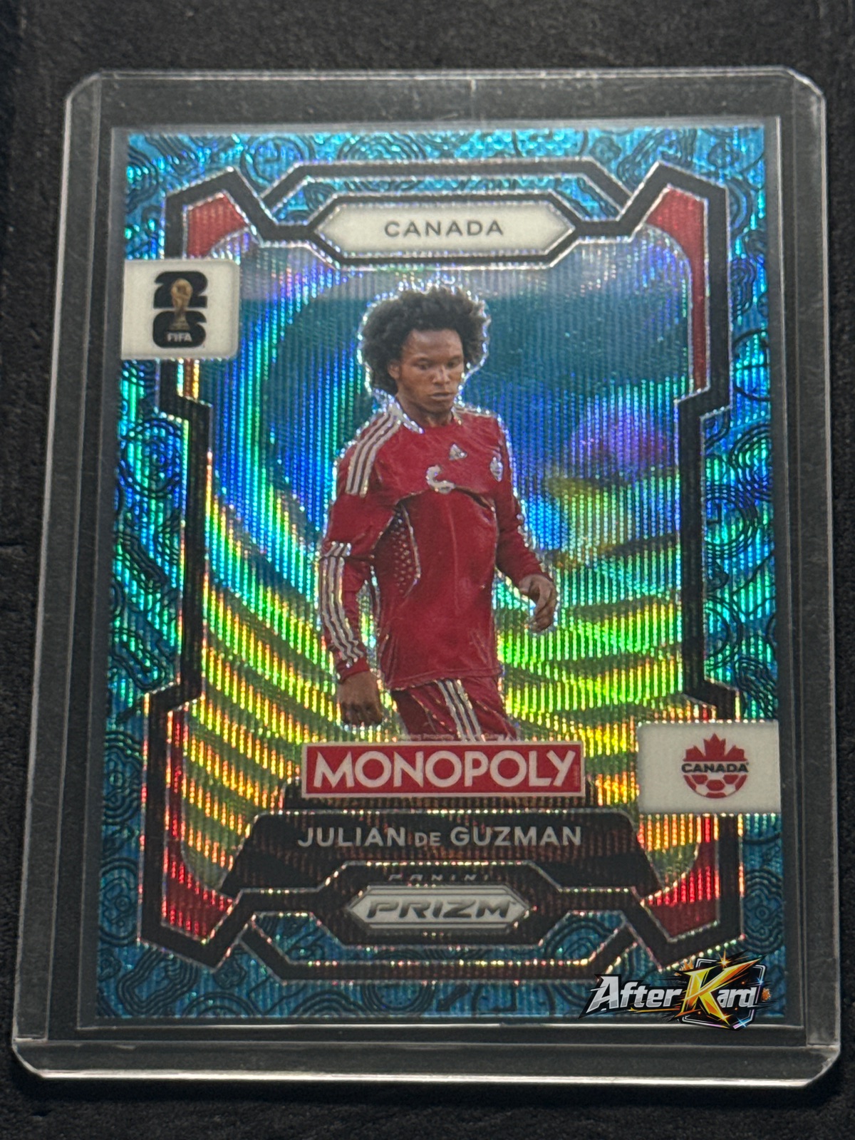 2026 Panini Monopoly Prizm FIFA World Cup 26 — Julian De Guzman Blue Wave Prizm